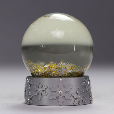 SWAROVSKI snow globe with gold and silver glitter