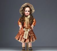 JUMEAU - Bisque head doll, size 11, closed mouth, fixed wrists, in original clothes.