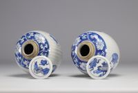 Pair of Kangxi period tonneau-covered vases