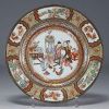 China - A polychrome porcelain plate, decorated with figures, animals and flowers, early 18th century.