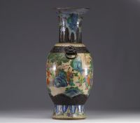 A nanking porcelain vase decorated with characters from 19th century