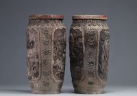 Japan - Pair of stoneware vases decorated with figures and animals, Meiji period.