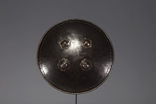 Persia - Shield with four steel ambos, 19th century.