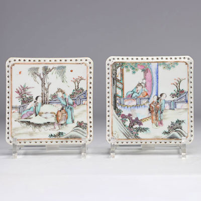 China - A pair of Famille Rose porcelain plaques decorated with figures.