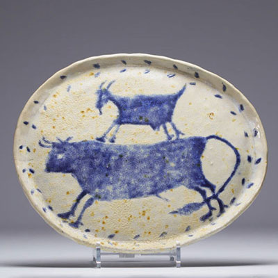 Glazed ceramic tray decorated with bulls in the style of Picasso, signed J.V., circa 1950.