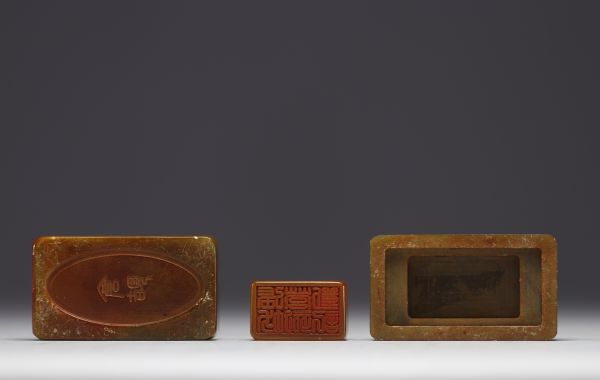 China - Honey-coloured stealite seal in its box.