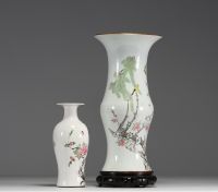 China - Set of two polychrome porcelain vases decorated with birds, circa 1900.