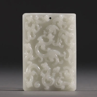 China - White jade pendant with chimera design.