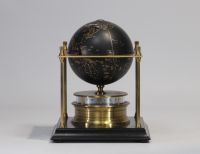 The Royal Geographical Society World Clock - Arthur IMHOF Black lacquered metal and gilt metal globe clock with brass identification plate