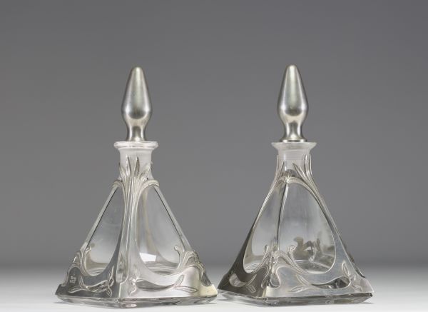 Pair of glass and pewter decanters in the Art Nouveau style.