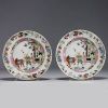 China - Pair of pink family polychrome porcelain plates, 19th century.