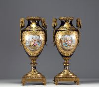 Sèvres - Pair of polychrome porcelain cassolettes with floral decoration, gilt bronze mounts, marks under the pieces.