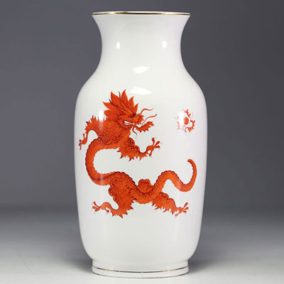 Meissen - Porcelain vase decorated with orange dragons on a white background.