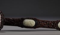China - Large Ruyi scepter in carved Zitan wood and celadon jade, decorated with bats and peaches.
