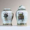 China - Pair of pink family polychrome porcelain vases with antique furniture decoration, 19th century.