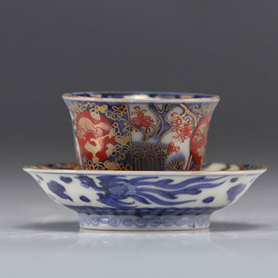 Japanese porcelain bowl and saucer in blue and red with mark under the piece