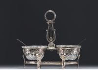 Table salt cellar in solid silver with antique decoration in the Empire style, French work from the 19th century.