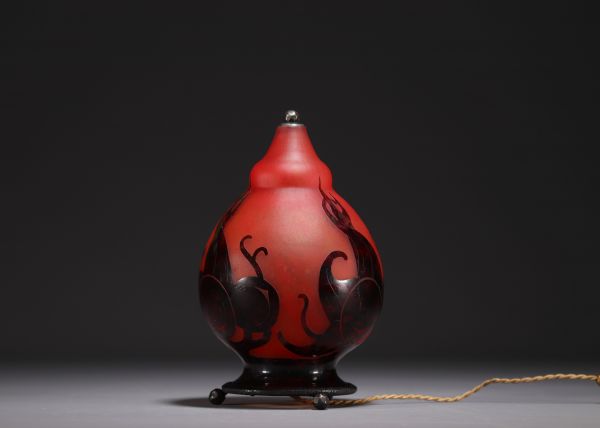 Le Verre Français - Multilayered glass night-light with plum decoration on a wrought-iron base, signed.