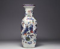 China - Large polychrome porcelain vase richly decorated with figures and furniture, 19th century.