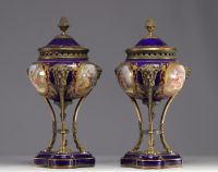 Pair of Sèvres porcelain cassolettes decorated with gallant scenes, mounted on bronze.