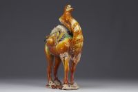 China - Tang-style glazed stoneware camel, unidentified period.