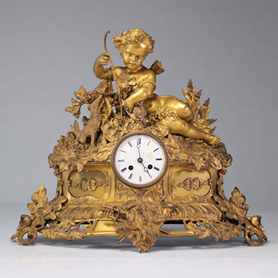 Louis XV clock in gilded bronze surmounted by a young archer