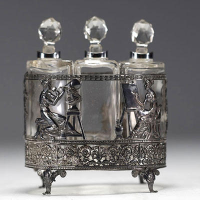 Three glass perfume bottles with silver mountings in the Empire style.