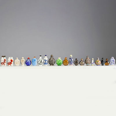 China - Set of twenty snuffboxes in various materials such as Peking glass, cloisonné and porcelain.