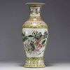 China - A green family polychrome porcelain vase decorated with warriors, 19th century.