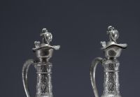 Pair of Baccarat crystal and silver wine decanters.