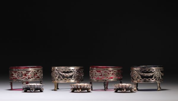 Set of four silver and three silver-plated metal salad bowls. 19th and 20th century.