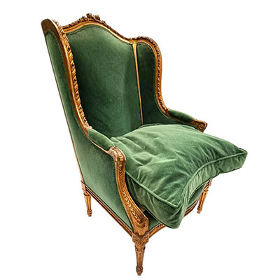 Emerald green armchair in carved wood in the Louis XVI style