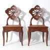 Émile GALLÉ (1846 - 1904) ‘Ombelles’ model Exceptional pair of solid walnut chairs, circa 1903-1904