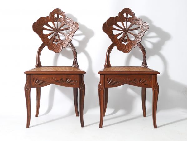 Émile GALLÉ (1846 - 1904) ‘Ombelles’ model Exceptional pair of solid walnut chairs, circa 1903-1904