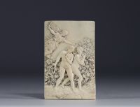 An ivory plaque carved in low relief depicting Eve and Adam expelled from paradise, late 17th century.