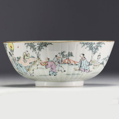 China - Large famille rose porcelain bowl decorated with figures.