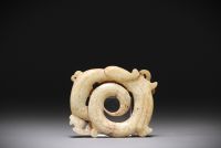 China - White jade pendant representing a phoenix.