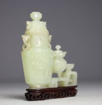 China - Jadeite sculpture representing two covered pots on a wooden base.