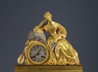 Gilt bronze clock from the Charles X period, dial signed ‘Fontanil, rue St Martin, 16ème’.