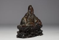 China - Li Bai Qing, bronze statue on openwork wooden base, Qing period.