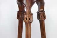 Art Nouveau harness in carved walnut with floral motif.