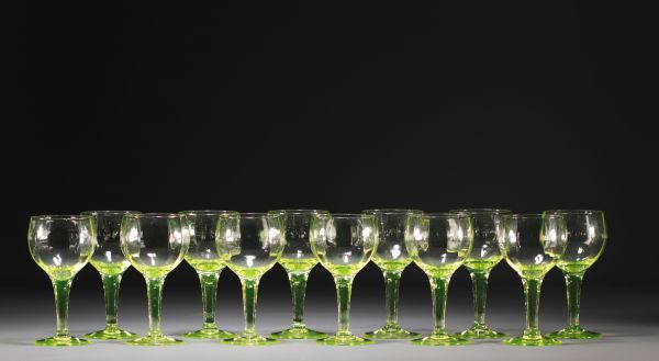 Set of twelve faceted glasses on urane stems.