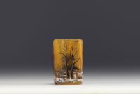 DAUM Nancy - Enamelled and acid-etched glass miniature vase decorated with a snowy landscape, signed under the piece.