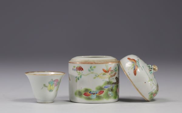 China - Small covered pot enclosing a cup in famille rose porcelain decorated with butterflies.