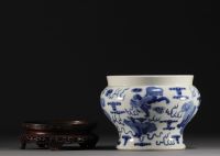 China - A blue-white porcelain vase decorated with lions, Kangxi mark.