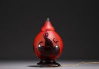 Le Verre Français - Multilayered glass night-light with plum decoration on a wrought-iron base, signed.