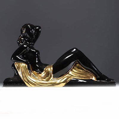 Charles LEMANCEAU ‘Reclining Woman’ Art Deco sculpture in black and gold ceramic.