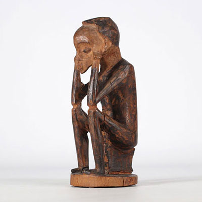 Lulua sculpture of a seated figure from the Democratic Republic of Congo