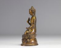 Gilded bronze Buddha probably from the Ming period - with a mark on the back