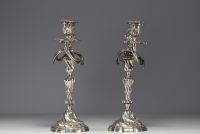 A pair of Louis XV silver-plated bronze candlesticks.